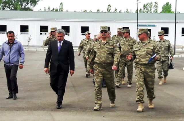 Azerbaijan Defense Minister reviews progress of construction of military camps on frontline - PHOTOS